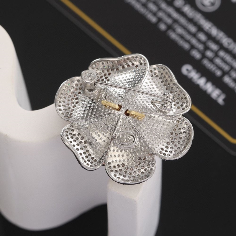 Ch**el brooches